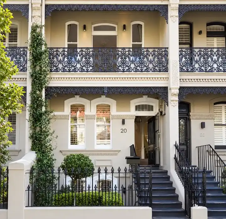 A Victorian terrace on Union Street, Paddington, with its cast iron lace balconies and front fence repainted by Proview Painting
