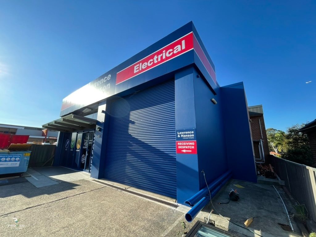 L&H Electrical Gladesville branch exterior repainted in L&H corporate blue by Proview Painting — commercial rebrand photo 2