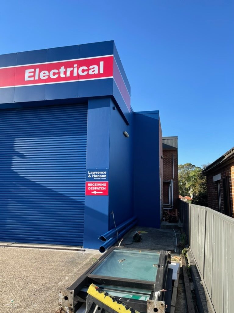 L&H Electrical Gladesville branch exterior repainted in L&H corporate blue by Proview Painting — commercial rebrand photo 4
