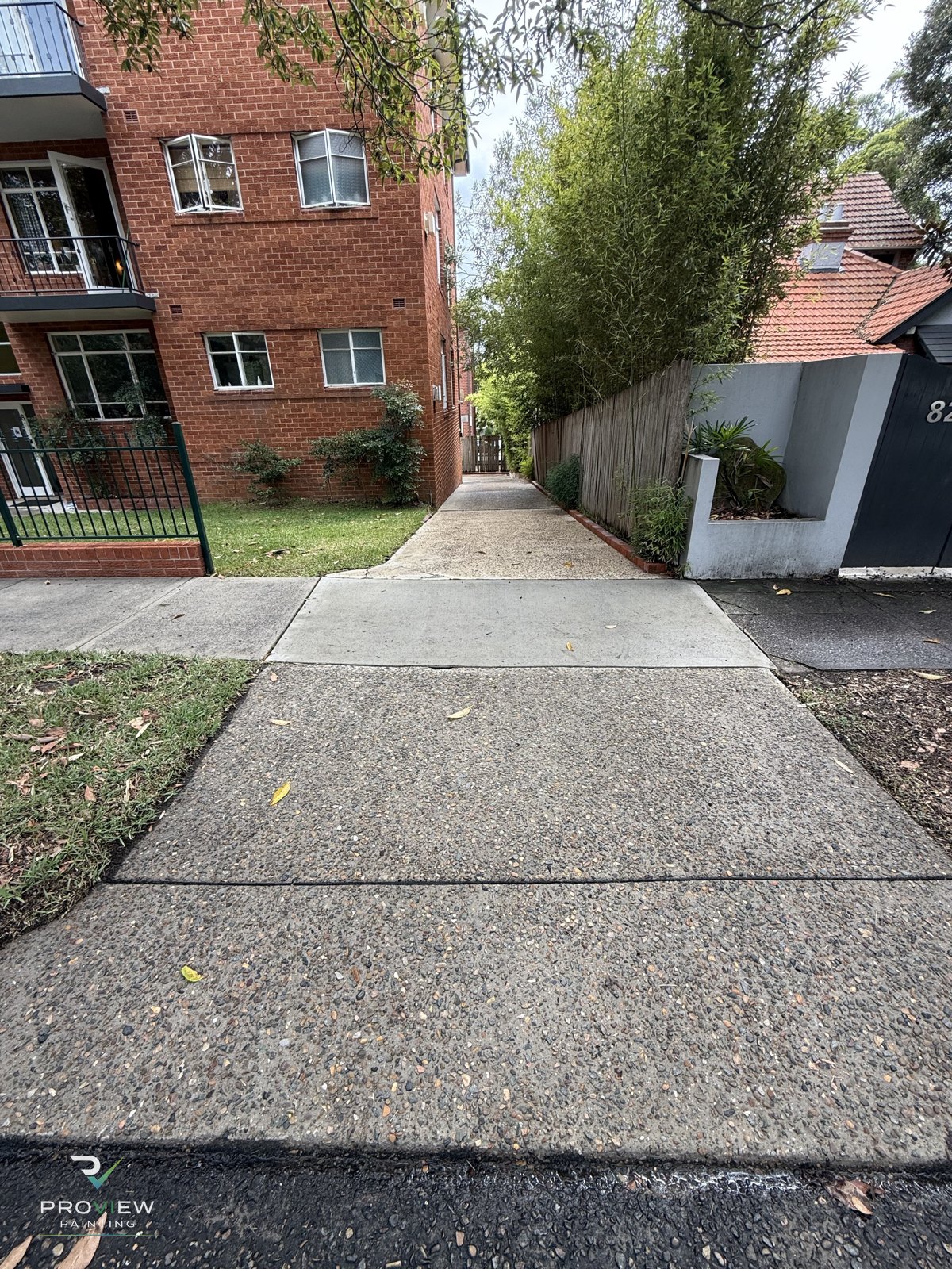 The same side path washed back to clean concrete